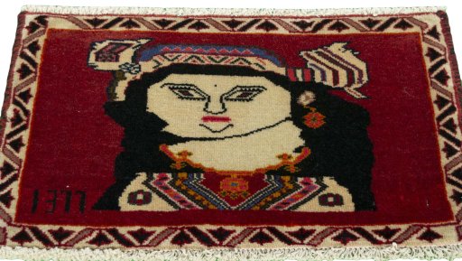 Surface texture of 2000s Shiraz rug with natural Wool and intricate pattern
