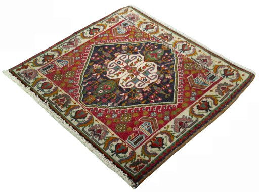 Corner detail of 2000s Shiraz rug showing border pattern and Wool pile