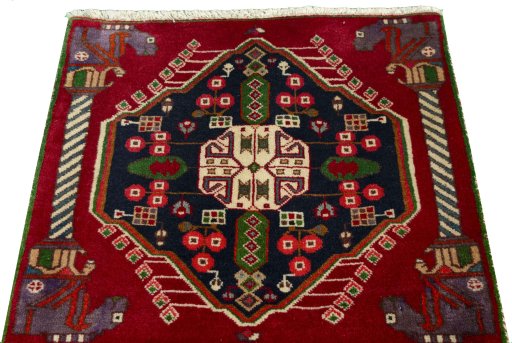 Surface texture of 2000s Shiraz rug with natural Wool and intricate pattern