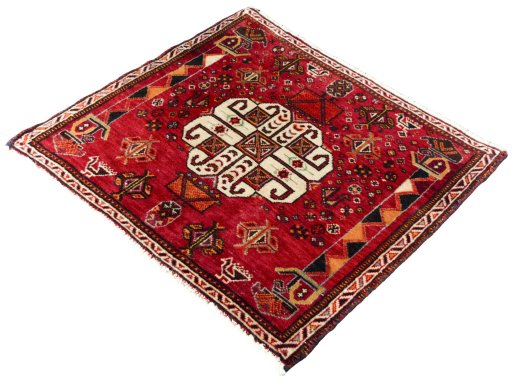 Corner detail of 2000s Shiraz rug showing border pattern and Wool pile