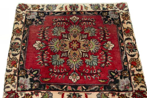 Surface texture of 2000s Shiraz rug with natural Wool and intricate pattern