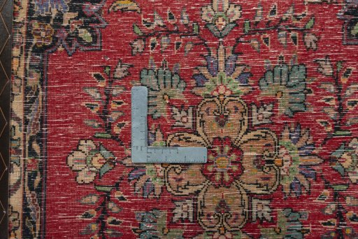 Backside of handmade 2000s Shiraz rug showing knot structure and weave density