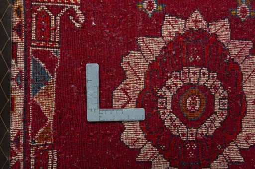 Backside of handmade 2000s Shiraz rug showing knot structure and weave density