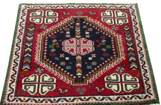 Surface texture of 2000s Shiraz rug with natural Wool and intricate pattern