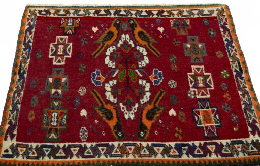 Surface texture of 2000s Shiraz rug with natural Wool and intricate pattern
