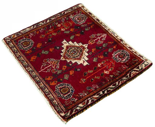 Corner detail of 2000s Shiraz rug showing border pattern and Wool pile