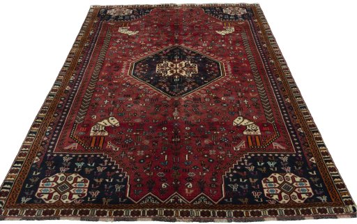 Surface texture of 2000s Shiraz rug with natural Wool and intricate pattern