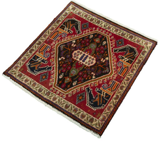Corner detail of 2000s Shiraz rug showing border pattern and Wool pile