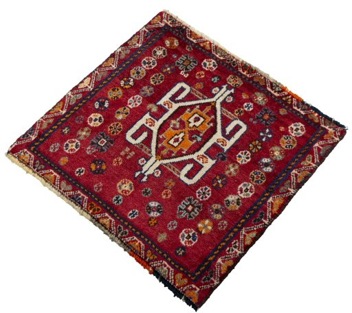 Corner detail of 2000s Shiraz rug showing border pattern and Wool pile