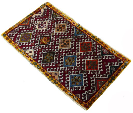 Corner detail of 2000s Shiraz rug showing border pattern and Wool pile