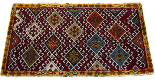 Surface texture of 2000s Shiraz rug with natural Wool and intricate pattern