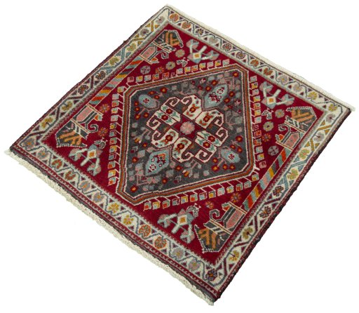 Corner detail of 2000s Shiraz rug showing border pattern and Wool pile