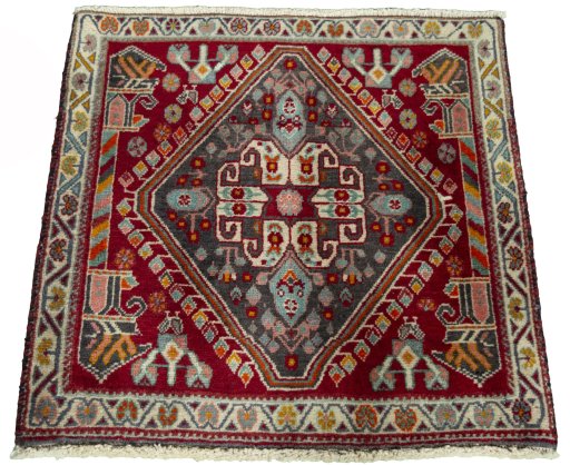 Surface texture of 2000s Shiraz rug with natural Wool and intricate pattern