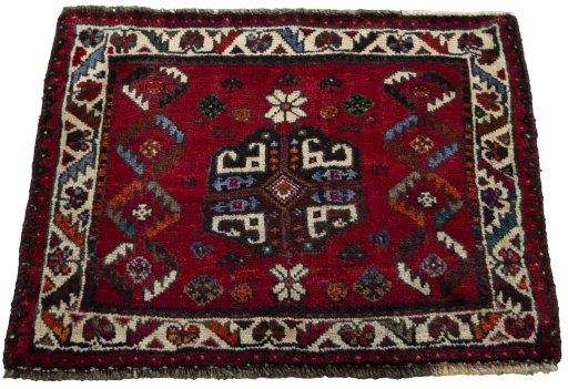 Surface texture of 2000s Shiraz rug with natural Wool and intricate pattern