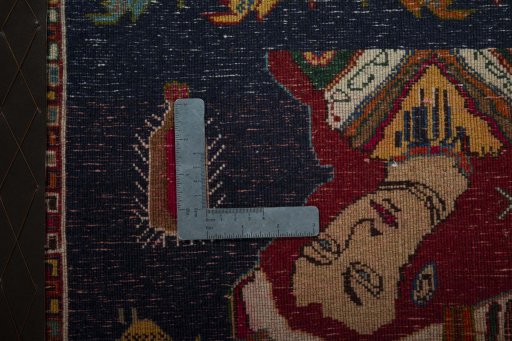 Backside of handmade 2000s Shiraz rug showing knot structure and weave density