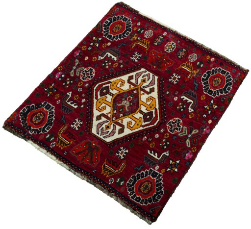 Corner detail of 2000s Shiraz rug showing border pattern and Wool pile