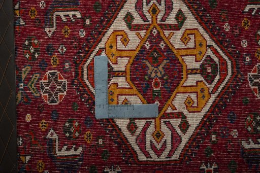 Backside of handmade 2000s Shiraz rug showing knot structure and weave density