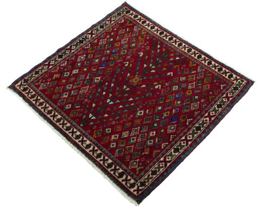 Corner detail of 2000s Shiraz rug showing border pattern and Wool pile
