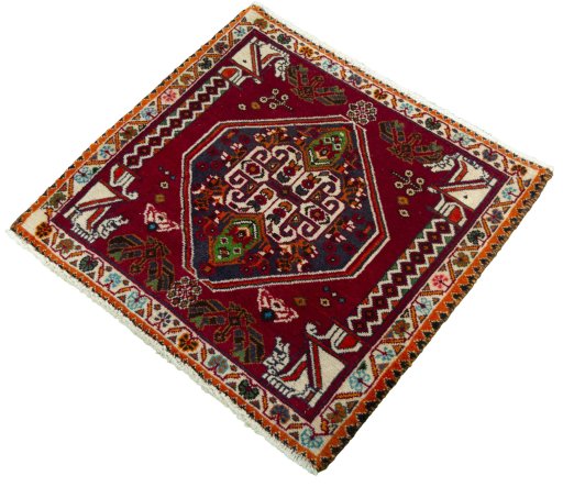 Corner detail of 2000s Shiraz rug showing border pattern and Wool pile