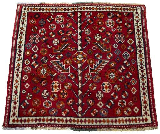 Surface texture of 2000s Shiraz rug with natural Wool and intricate pattern
