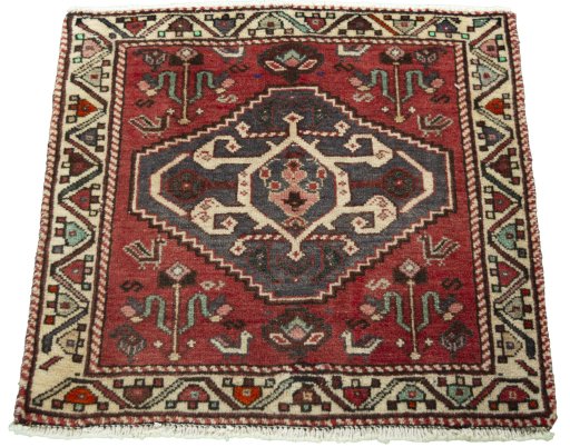 Surface texture of 2000s Shiraz rug with natural Wool and intricate pattern