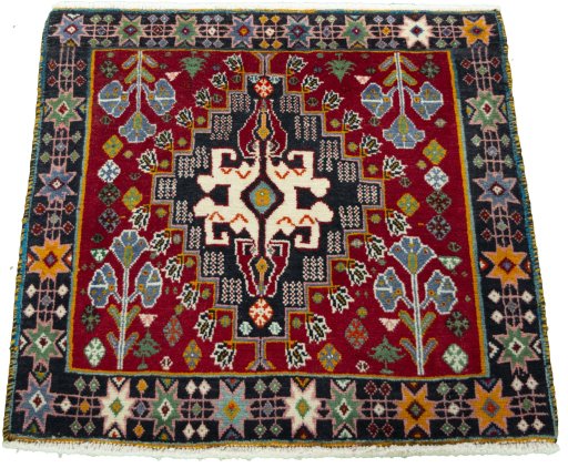 Surface texture of 2000s Shiraz rug with natural Wool and intricate pattern