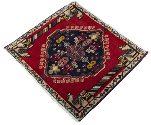 Corner detail of 2000s Shiraz rug showing border pattern and Wool pile
