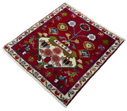 Corner detail of 2000s Shiraz rug showing border pattern and Wool pile