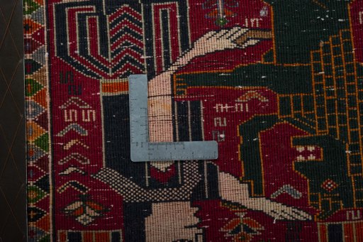 Backside of handmade 2000s Shiraz rug showing knot structure and weave density