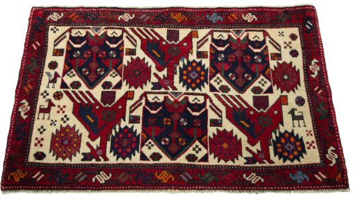 Surface texture of 2000s Shiraz rug with natural Wool and intricate pattern