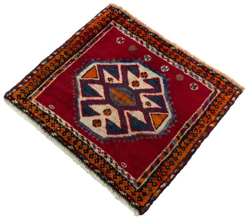 Corner detail of 2000s Shiraz rug showing border pattern and Wool pile