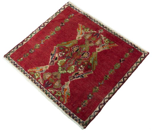 Corner detail of 2000s Shiraz rug showing border pattern and Wool pile