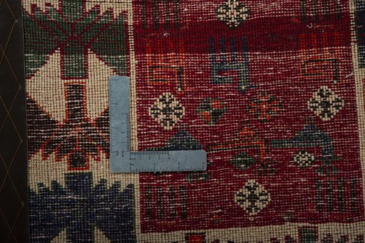 Backside of handmade 2000s Shiraz rug showing knot structure and weave density