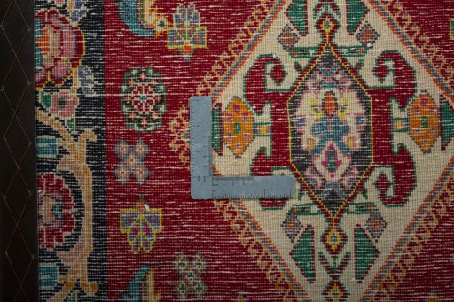 Backside of handmade 2000s Shiraz rug showing knot structure and weave density
