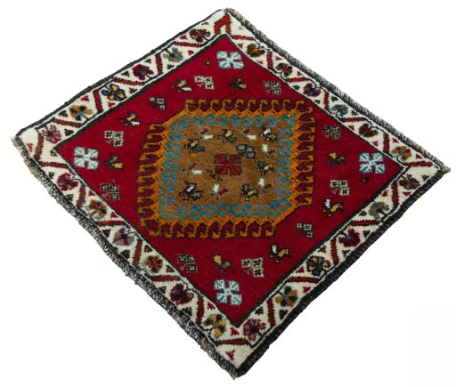 Corner detail of 2000s Shiraz rug showing border pattern and Wool pile