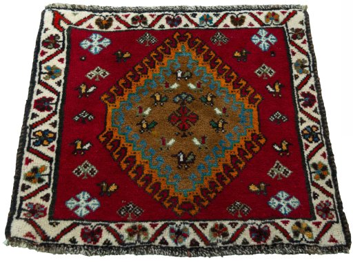 Surface texture of 2000s Shiraz rug with natural Wool and intricate pattern