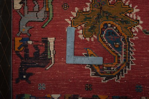Backside of handmade 2000s Shiraz rug showing knot structure and weave density