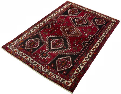 Corner detail of 2000s Shiraz rug showing border pattern and Wool pile