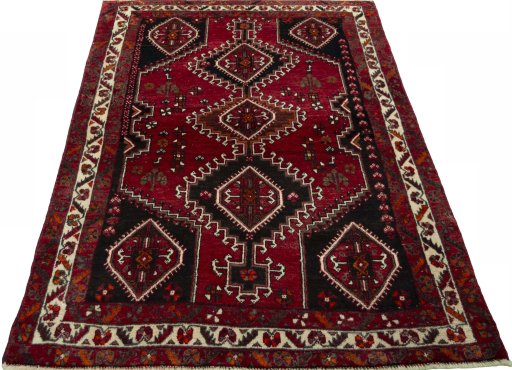 Surface texture of 2000s Shiraz rug with natural Wool and intricate pattern