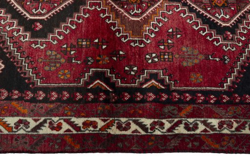 Close-up detail of 2000s Shiraz rug from Iran / Persia showing Wool weave
