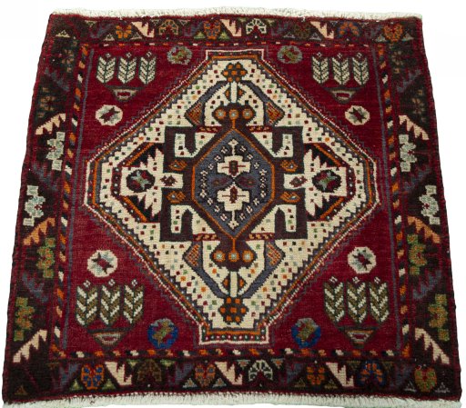 Surface texture of 2000s Shiraz rug with natural Wool and intricate pattern