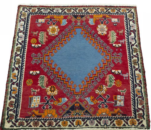 Surface texture of 2000s Shiraz rug with natural Wool and intricate pattern