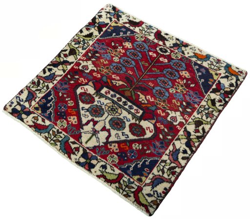 Corner detail of 2000s Shiraz rug showing border pattern and Wool pile