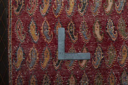 Backside of handmade 2000s Shiraz rug showing knot structure and weave density