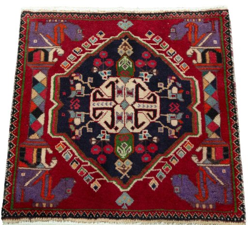 Surface texture of 2000s Shiraz rug with natural Wool and intricate pattern