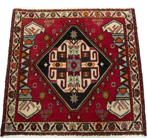 Surface texture of 2000s Shiraz rug with natural Wool and intricate pattern