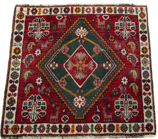 Surface texture of 2000s Shiraz rug with natural Wool and intricate pattern