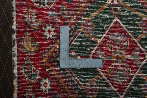 Backside of handmade 2000s Shiraz rug showing knot structure and weave density