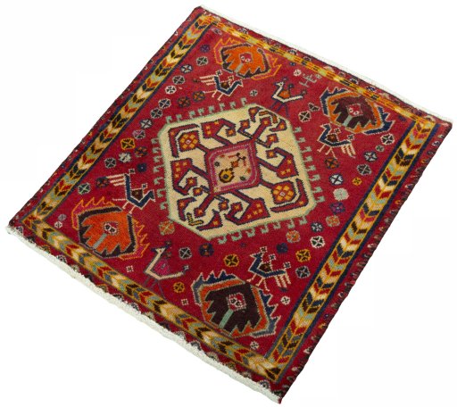 Corner detail of 2000s Shiraz rug showing border pattern and Wool pile