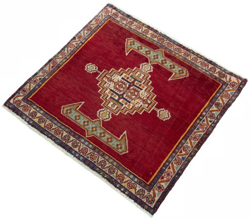 Corner detail of 2000s Shiraz rug showing border pattern and Wool pile